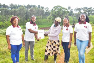 client receiving title deed